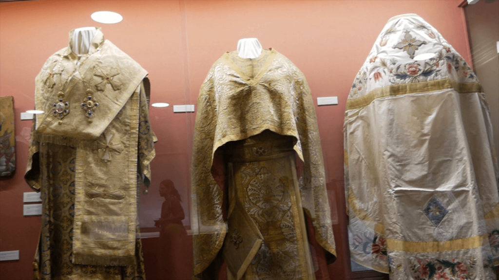 a group of religious robes on mannequins